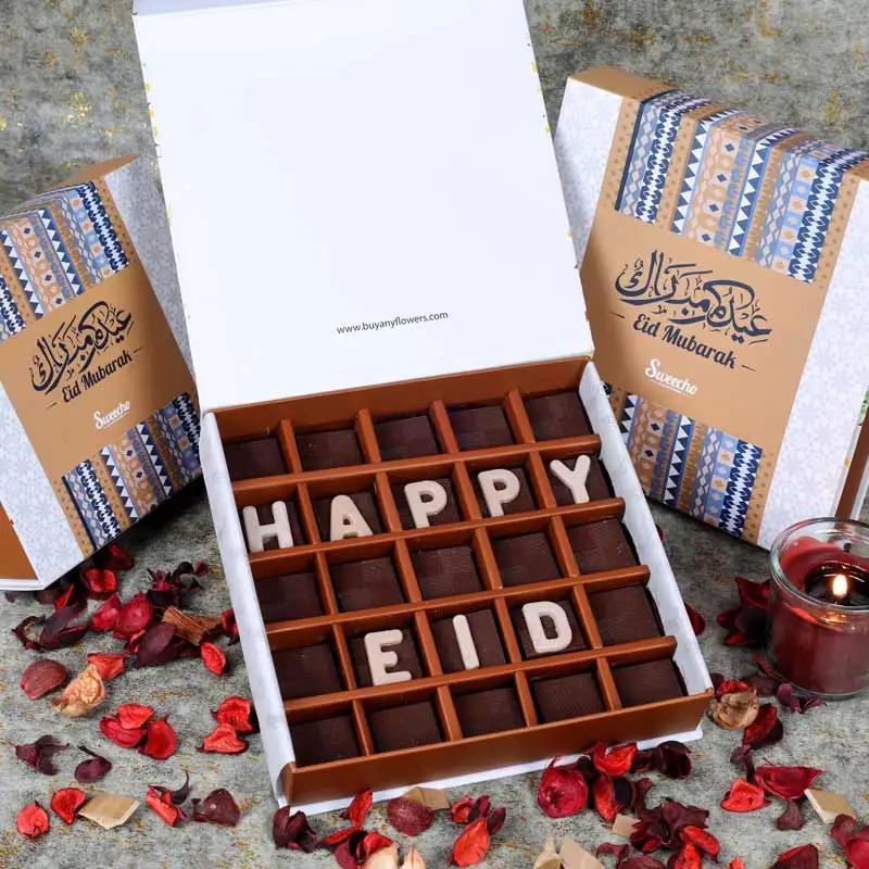 Happy Eid Chocolates By SweechoChocolate & ConfectioneryProduct Description Brand - Sweecho Text - Happy Eid Type - Milk Chocolate Quantity - 25 Pcs Marble Chocolate Letters Assorted Flavors - Pistachio, Cheesecake, Lotus, Hazelnut, Coffee, Cornflakes and