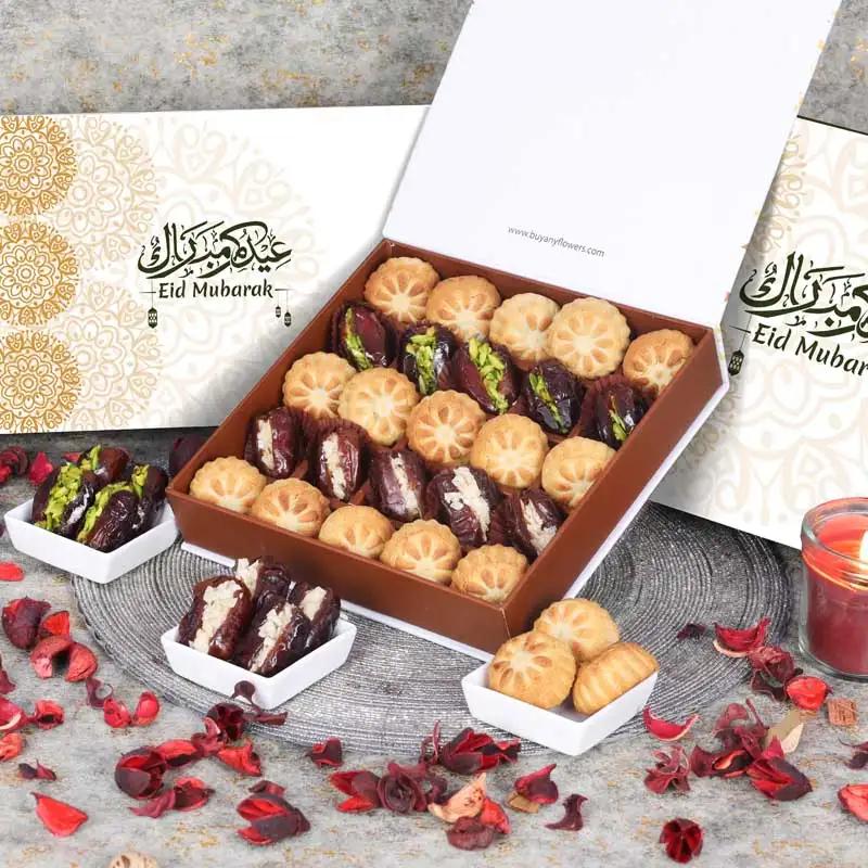 Eid Stuffed Dates And Mamoul By Sweecho 25 Pcs GreenChocolate & ConfectioneryProduct Description Assorted Stuffed Dates and Dates Mamoul Flavors - Pistachio and Almond Quantity - 25 Pcs Arranged in a Beautiful Eid Gift Box