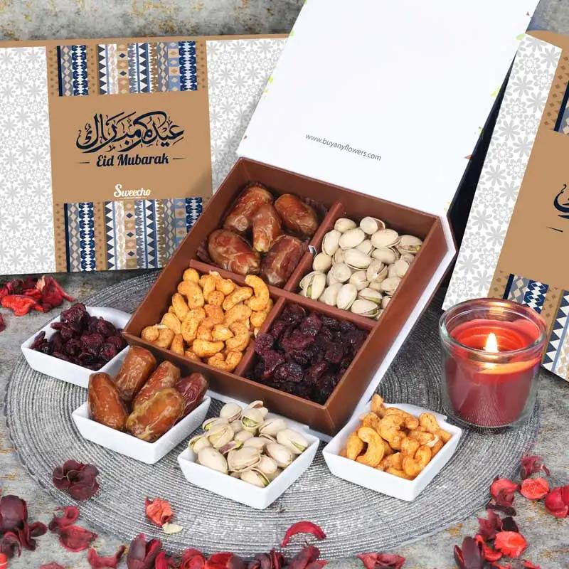 Delightful Eid Gift Box BlueChocolate & ConfectioneryProduct Description Plain Dates 80gm Approx Chilli Cashew 100gm Approx Pistachio 100gm Approx Cranberries - 100gm Approx Arranged in a Gift Box