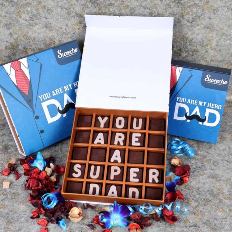 You Are A Super Dad Chocolates By SweechoChocolate & ConfectioneryBrand - Sweecho, Text - You Are A Super Dad, Type - Milk Chocolate, Quantity - 25 Pcs, Marble Chocolate Letters, Assorted Flavors - Pistachio, Cheesecake, Lotus, Hazelnut, Coffee, Cornflake