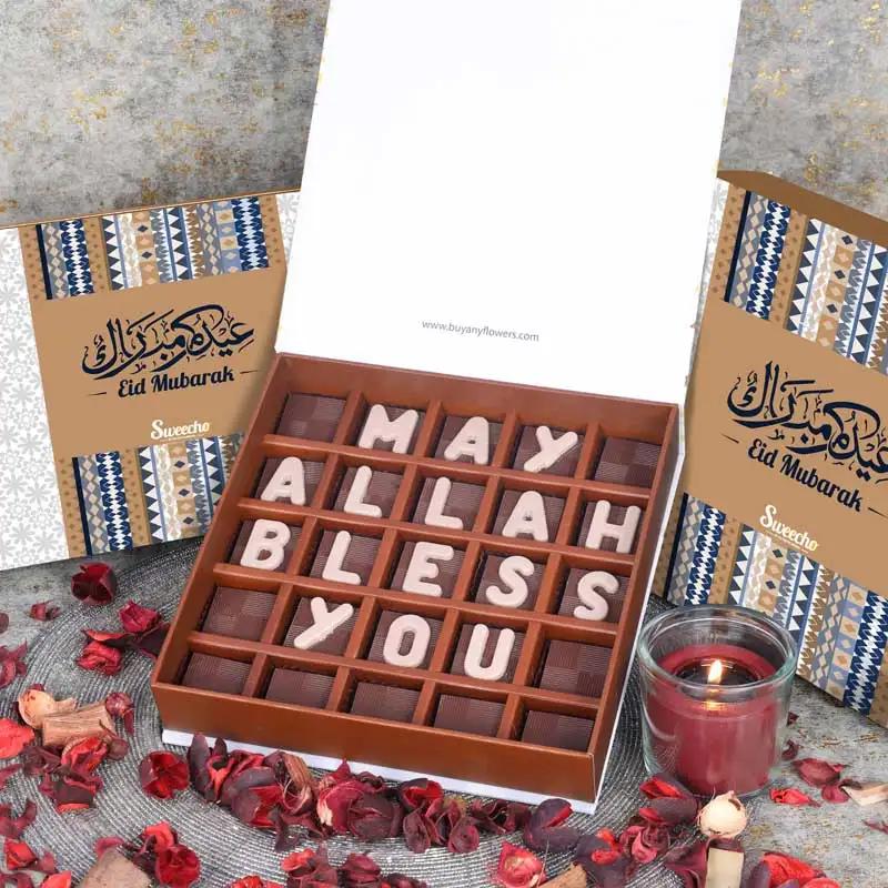 May Allah Bless You Chocolates By Sweecho For EidChocolate & ConfectioneryProduct Description Brand - Sweecho Text - May Allah Bless You Type - Milk Chocolate Quantity - 25 Pcs Marble Chocolate Letters Assorted Flavors - Pistachio, Cheesecake, Lotus, Haze