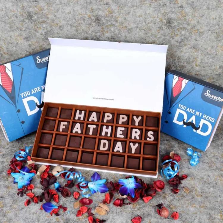 Fathers Day Chocolates By SweechoChocolate & ConfectioneryBrand - Sweecho, Text - Happy Fathers Day, Type - Milk Chocolate, Quantity - 32 Pcs, Marble Chocolate Letters, Assorted Flavors - Pistachio, Cheesecake, Lotus, Hazelnut, Coffee, Cornflakes and Mix