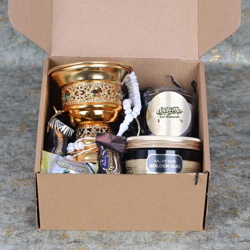 Eid Meditating Fragrance HamperGifts and HampersProduct Description 1 Prayer Beads 1 Swiss Arabia Bakhoor 1 Bakhoor Burner 1 Scented Jar Candle Chocolate Coated Dates with Nuts 5 Pcs Arranged in a Box