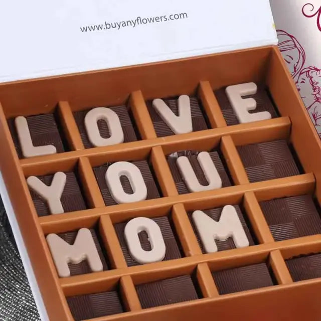 Love You Mom Chocolates By Sweecho 16 PcsChocolate & ConfectioneryBrand - Sweecho Text - Love You Mom Type - Milk Chocolate Quantity - 16 Pcs Marble Chocolate Letters Assorted Flavors - Pistachio, Cheesecake, Lotus, Hazelnut, Coffee, Cornflakes and Mix Nu