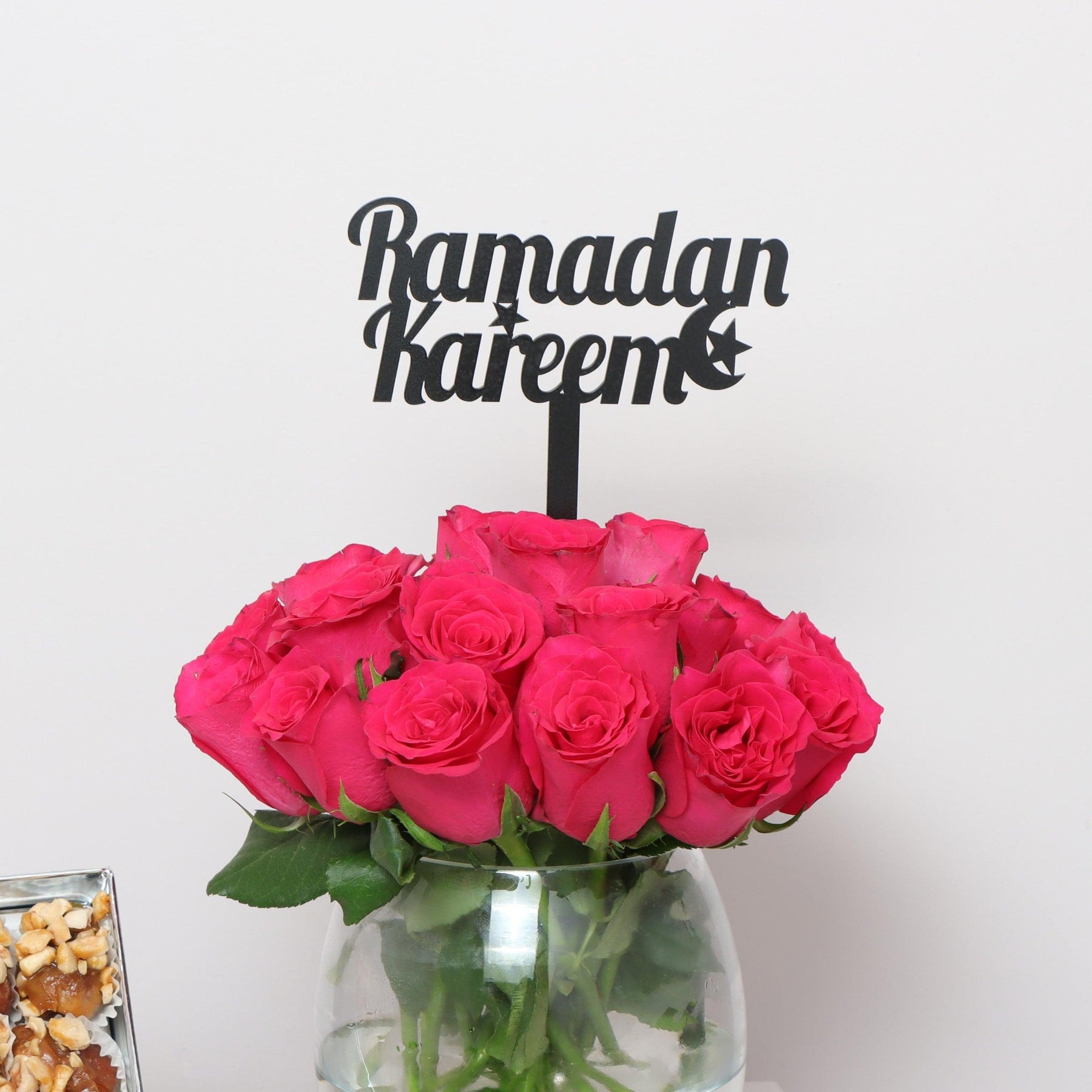Pink Rose Vase and Nutted Dates 0.5 KgFlowersIntroducing your go-to Ramadan traditional roses and festive nutted dates. Order this fabulous combination and have it delivered to your loved ones' homes to add joy and sweetness to their holly month of Ramada