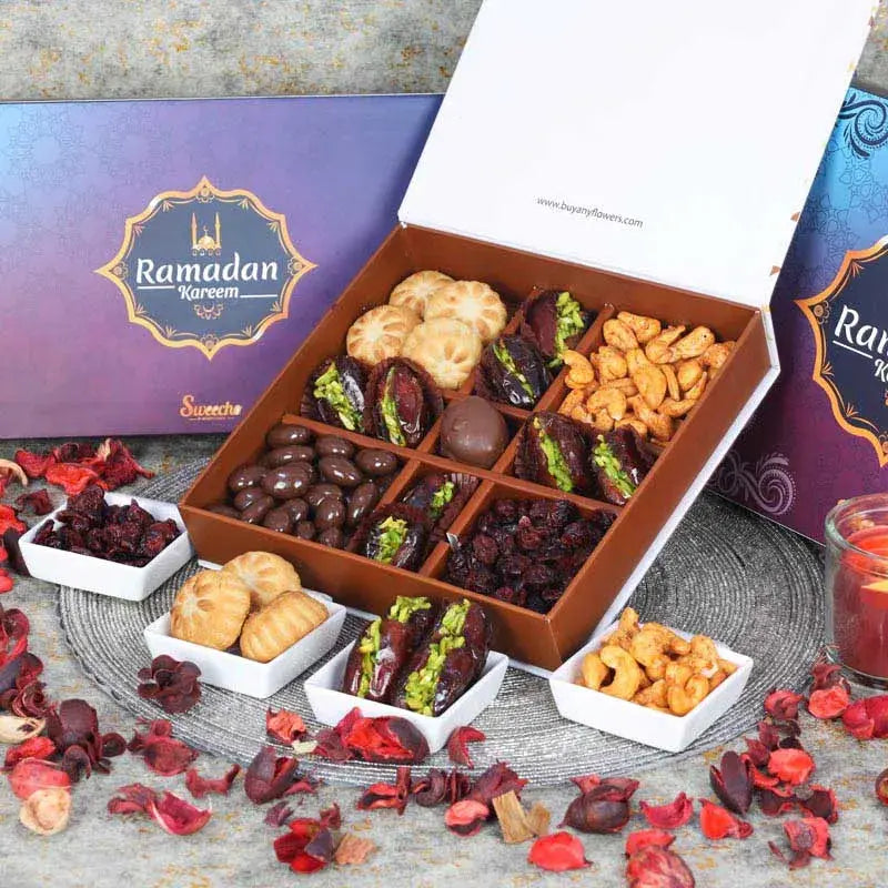 Ramadan Delight Gift Box BlueGifts and HampersGift Includes: Chilli Cashew 100gm Approx Mamoul Dates 100gm Approx Cranberries - 100gm Approx Chocolate Coated Almonds 100gm Approx Stuffed Dates with Pistachio 80gm Approx Arranged in a Gift Box