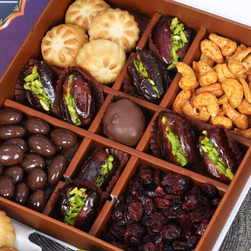 Ramadan Delight Gift Box BlueGifts and HampersGift Includes: Chilli Cashew 100gm Approx Mamoul Dates 100gm Approx Cranberries - 100gm Approx Chocolate Coated Almonds 100gm Approx Stuffed Dates with Pistachio 80gm Approx Arranged in a Gift Box