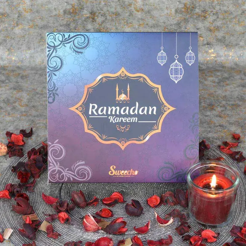Ramadan Delight Gift Box BlueGifts and HampersGift Includes: Chilli Cashew 100gm Approx Mamoul Dates 100gm Approx Cranberries - 100gm Approx Chocolate Coated Almonds 100gm Approx Stuffed Dates with Pistachio 80gm Approx Arranged in a Gift Box