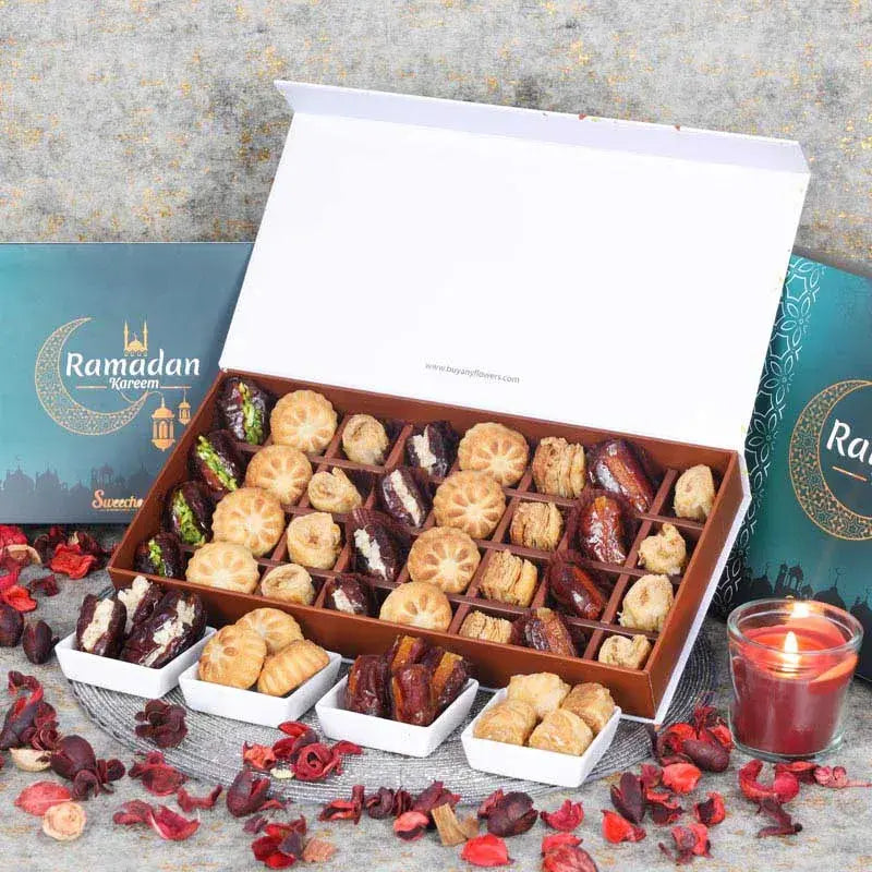 Ramadan Stuffed Dates Mamoul and Baklawa By Sweecho 32 Pcs GreenGifts and HampersAssorted Stuffed Dates, Mamoul and Baklawa Flavors - Pistachio, Almond and Orange Peel Quantity - 32 Pcs Arranged in a Beautiful Ramadan Gift Box