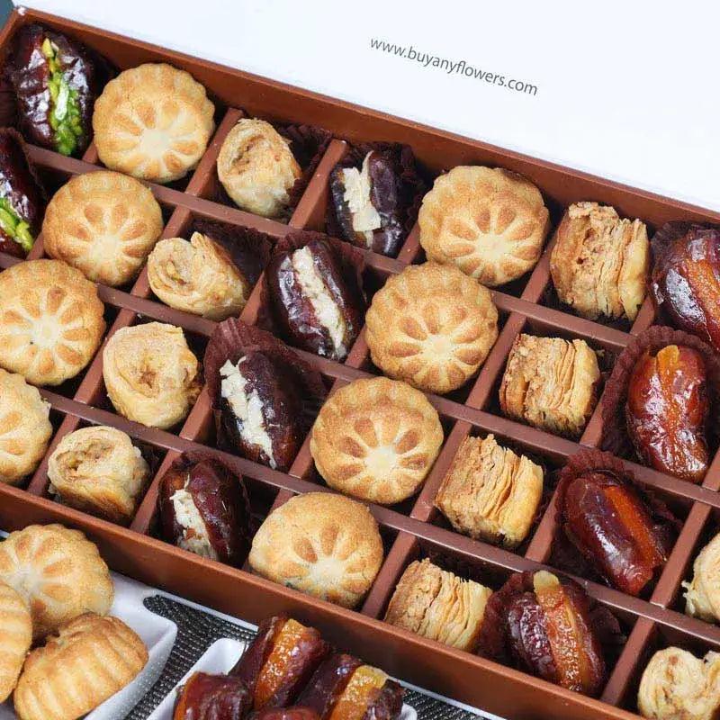 Ramadan Stuffed Dates Mamoul and Baklawa By Sweecho 32 Pcs GreenGifts and HampersAssorted Stuffed Dates, Mamoul and Baklawa Flavors - Pistachio, Almond and Orange Peel Quantity - 32 Pcs Arranged in a Beautiful Ramadan Gift Box