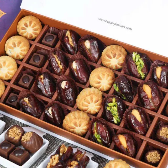 Ramadan Stuffed Dates Mamoul and Chocolates By Sweecho 32 Pcs BlueGifts and HampersAssorted Stuffed Dates, Mamoul and Chocolates Flavors - Pistachio, Cashew and Walnut, Coffee and Biscoff Quantity - 32 Pcs Arranged in a Beautiful Ramadan Gift Box