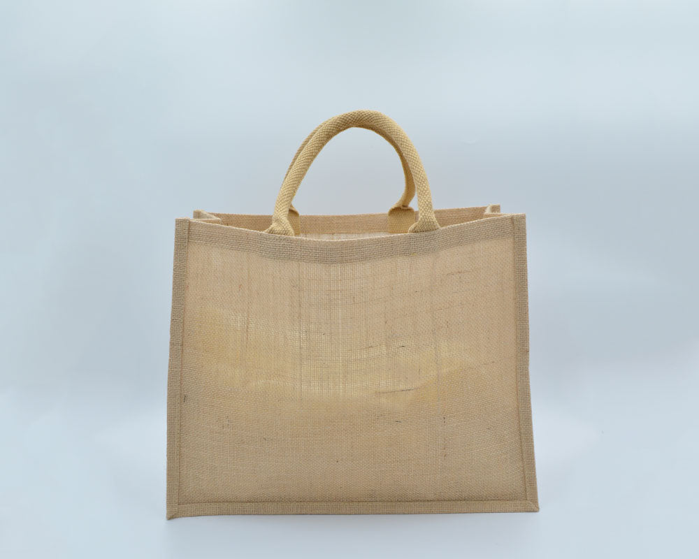 Eco Greeni Laminated Jute Bag - 100 PcsSustainable LivingLaminated Jute bag with canvas pocket / Velcro & button. Made from high-quality jute material (13x13 weave) with soft padded handles. Can be reused and in case of spills, clean the surface with a so