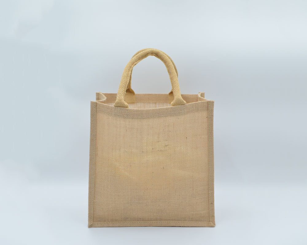 Eco Greeni Laminated Jute Bag 30W X 38H - 100 PcsSustainable LivingLaminated Jute bag with canvas pocket / Velcro & button. Made from high-quality jute material (13x13 weave) with soft padded handles. Can be reused and in case of spills, clean the surface