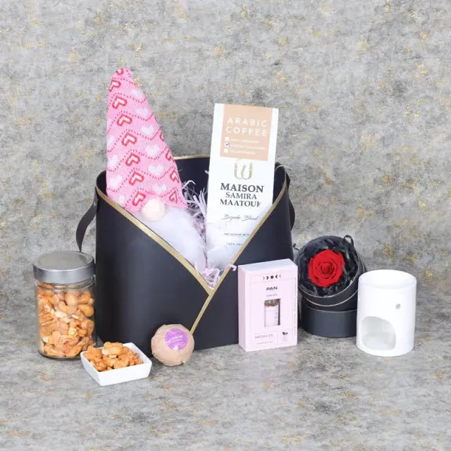 Womens Day Gift Box BlackGifts and HampersGift Includes: 1 Red Forever Rose in Black Box 1 Cute Soft Toy 30cm 1 Oil Burner 1 Aroma Oil Arabic Coffee 100gm Chilli Cashews 100gm 1 Bath Bomb Arranged in a Black Designer Box