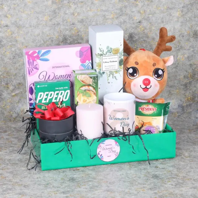 Womens Day Gift Tray GreenGifts and HampersGift Includes: 1 Red Forever Rose in Black Box Womens Day Premium Assorted Chocolates By Sweecho 16 Pcs 1 Reindeer Soft Toy 20cm 1 Reed Diffuser 1 Pepero Chocolate Almond Coated Sticks 32gm Savoury Crackers 150gm