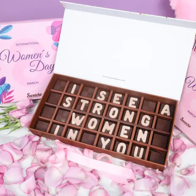 Womens Day I See a Strong Women in You Chocolates By SweechoChocolate & ConfectioneryBrand - Sweecho Text - I See a Strong Women in You Type - Milk Chocolate Quantity - 25 Pcs Marble Chocolate Letters Assorted Flavors - Pistachio, Cheesecake, Peanut, Cara