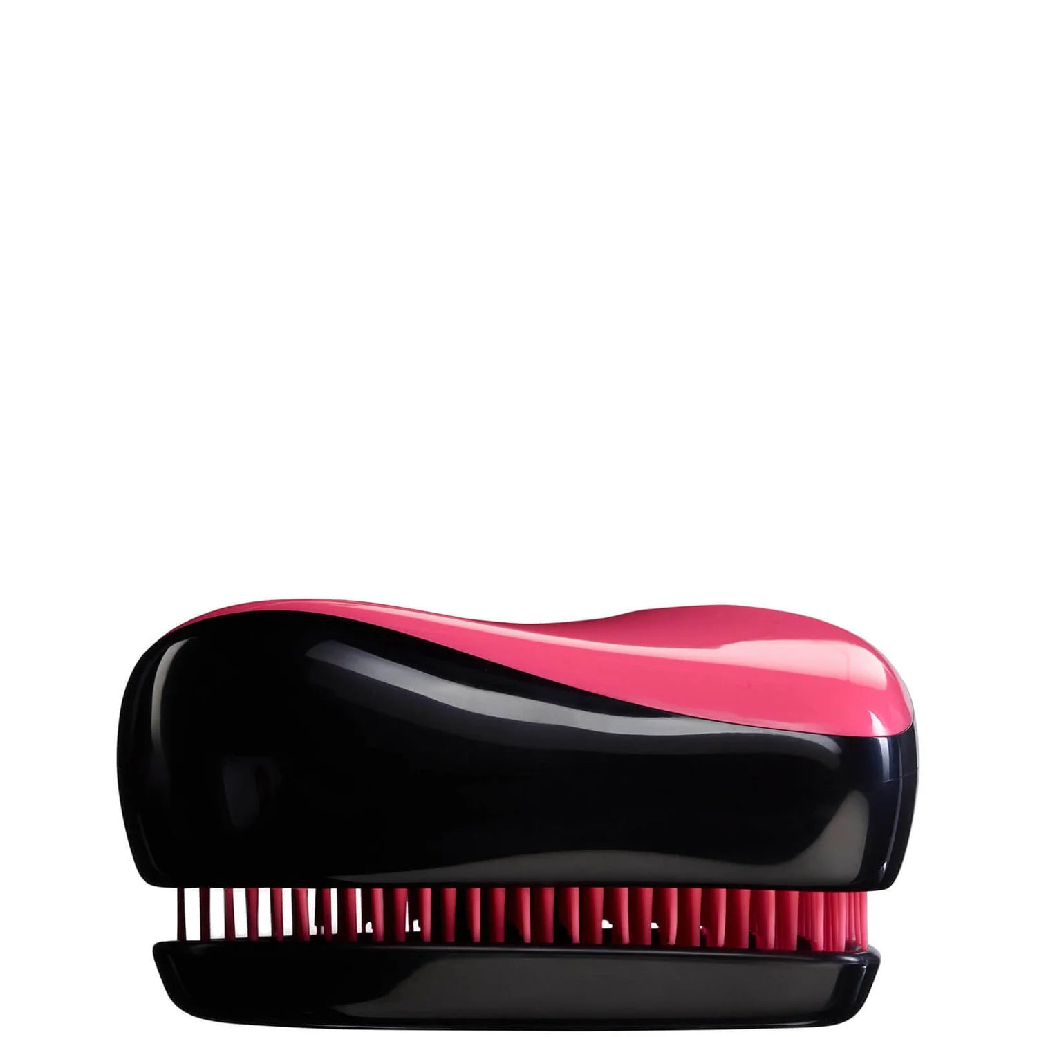 T.T Compact Pink Sizzle (black&pink)Hair CareA handbag friendly design. - You can smooth shine and define anytime and anywhere thanks to its unique two tiered system technology. - The long teeth detangle and the short teeth smooth the hair cuticle for hea