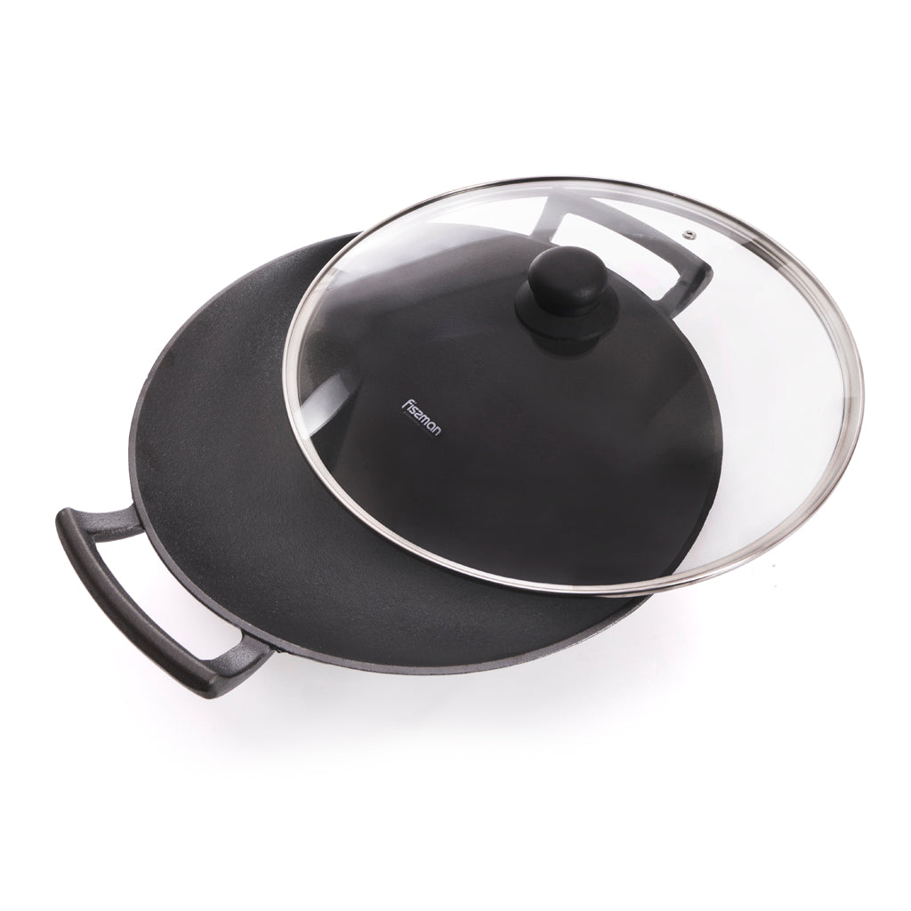 FISSMAN Cast Iron Wok 35x10.4cm/4.85 L with Glass LidKitchen Storage4145 Wok 35x10.4cm / 4.85 LTR with glass lid (cast iron) FISSMAN is one of the leaders in the global cookware market, producing environmentally friendly products that meet the highest sta