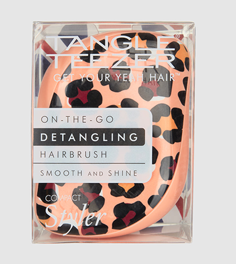Compact Styler - Apricot Leopard PrintHair CareA handbag friendly design. - You can smooth shine and define anytime and anywhere thanks to its unique two tiered system technology. - The long teeth detangle and the short teeth smooth the hair cuticle for h
