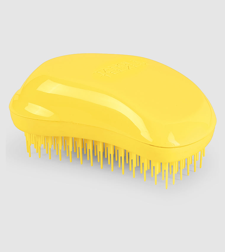 Small Original - YellowHair CareThe original detangling hairbrush by Tangle Teezer detangles and delivers an ideal finishing touch thanks to its distinct two-tiered teeth technology - the long teeth detangle and the short teeth smooth the hair cuticle for