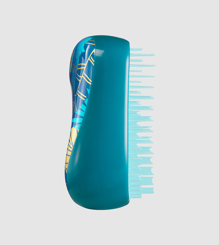 Compact Styler - Midnight TropicsHair CareA stunning petrol and gold leaf palm print adds the wow factor to this Christmas collection Compact Styler. A bag friendly hairbrush that detangles and styles. It delivers the perfect finishing touch when travelli