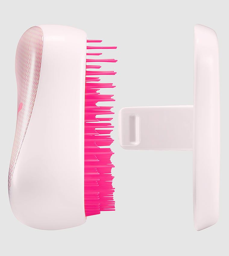 Tangle Teezer - Compact Styler - Puma - PinkHair CareTangle Teezer’s first collaboration with the sports brand PUMA helps you reach your hair goals as well as your fitness ones. Incorporating the distinct PUMA logo in a popping neon pink on the colourbrea