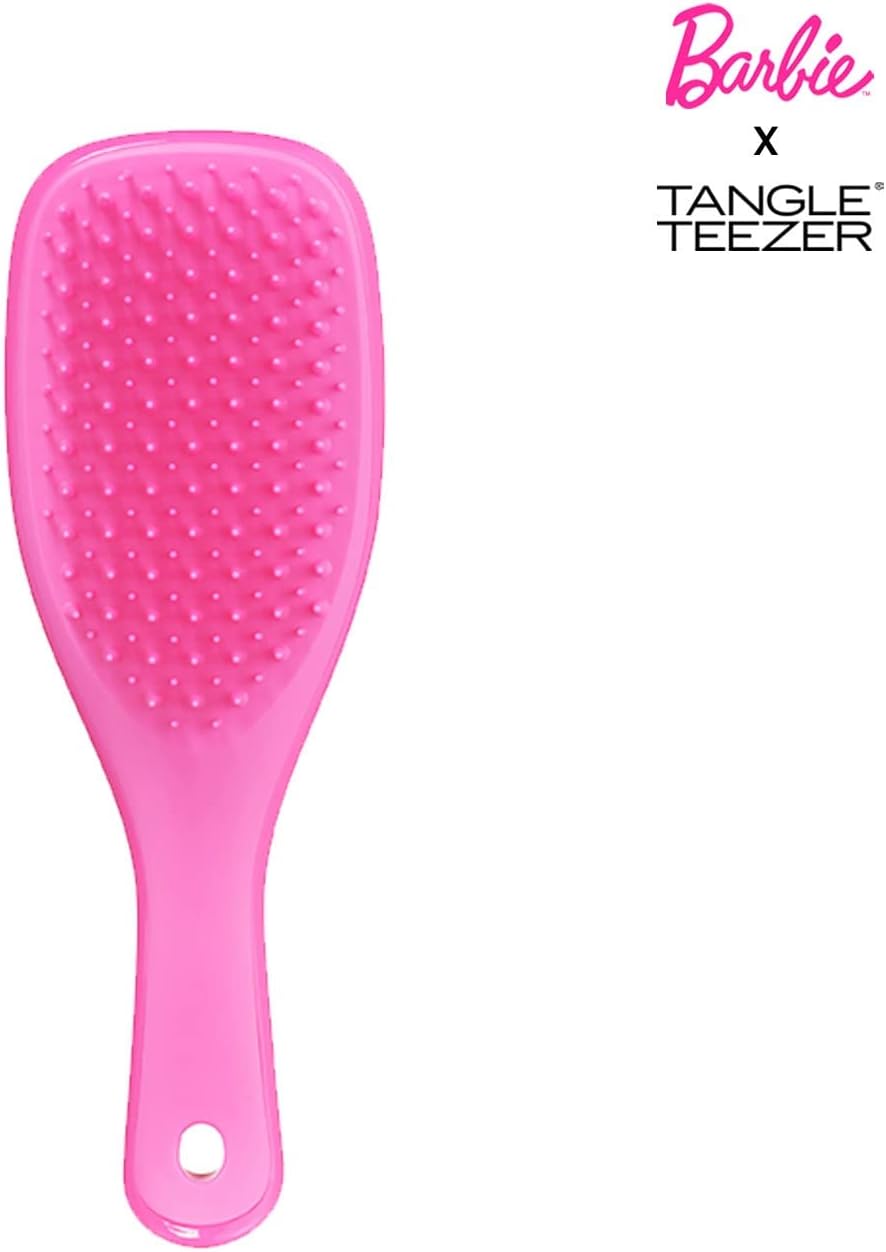 Ultimate Detangler Mini- Dopamine pinkHair CareThe Ultimate Detangler Mini Totally Pink Barbie™ Brush Mini Size Great hair starts with imagination It's your world, dream big with the Mini Totally Pink Barbie™ Brush. Two icons have come together to make ha