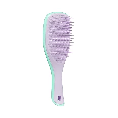 Mini Wet Detangler - Mint / LilacHair CareOur Mini Wet Detangler has had a sweet treat makeover! Using the same patented two-tiered teeth technology as The Wet Detangler, this size is perfect for travel, and has a savvy keyring hole on the handle that all