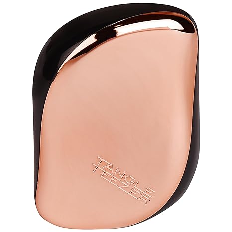 T.T Compact Black Rose GoldHair CareA handbag friendly design. - You can smooth shine and define anytime and anywhere thanks to its unique two tiered system technology. - The long teeth detangle and the short teeth smooth the hair cuticle for healthier lo