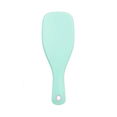 Mini Wet Detangler - Mint / LilacHair CareOur Mini Wet Detangler has had a sweet treat makeover! Using the same patented two-tiered teeth technology as The Wet Detangler, this size is perfect for travel, and has a savvy keyring hole on the handle that all