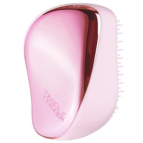 Compact Styler - Baby Pink ChromeHair CareCompact Styler Baby Pink Chrome Sweet and chic with super-light hues of blush, rose and peony that catch and reflect the light, our bag friendly hairbrush detangles and styles. Our bag friendly hairbrush detangles