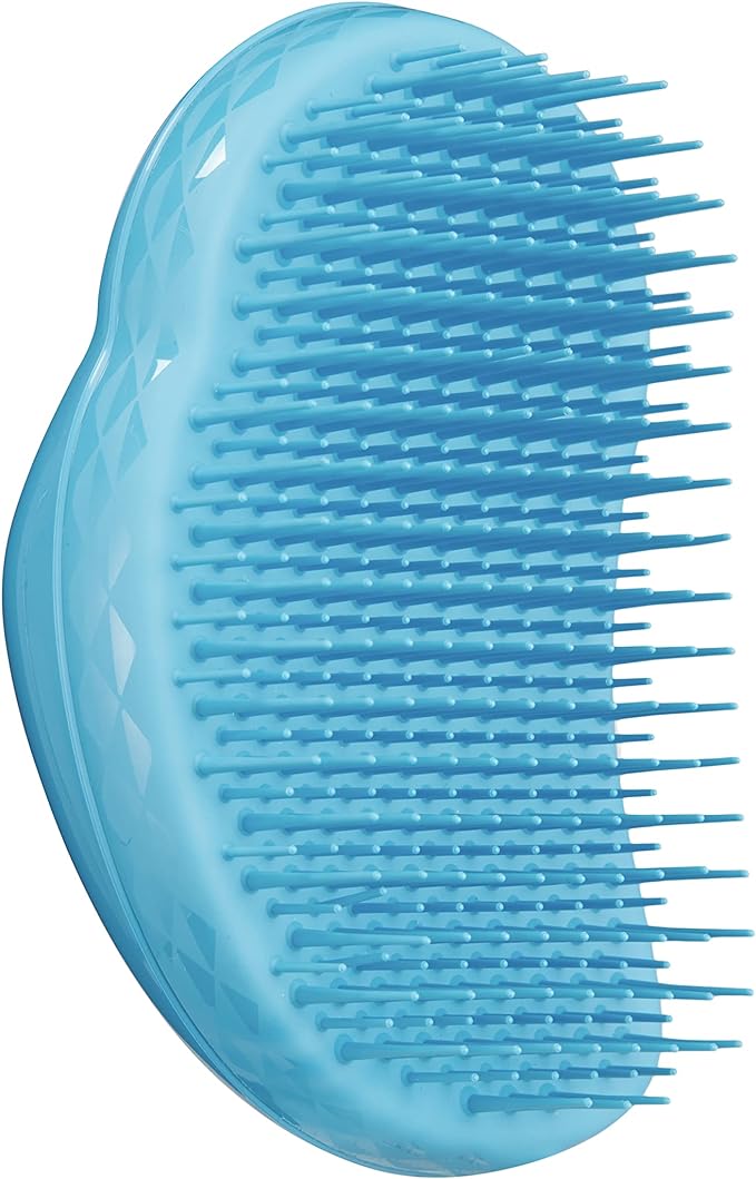 Thick & Curly - BlueHair CareThick & Curly Azure Blue New in, this beautiful azure blue Thick & Curly hairbrush is ideal for those with thick, curly, textured and Afro hair. The two-tiered patented teeth are longer and stronger than The Original and confi