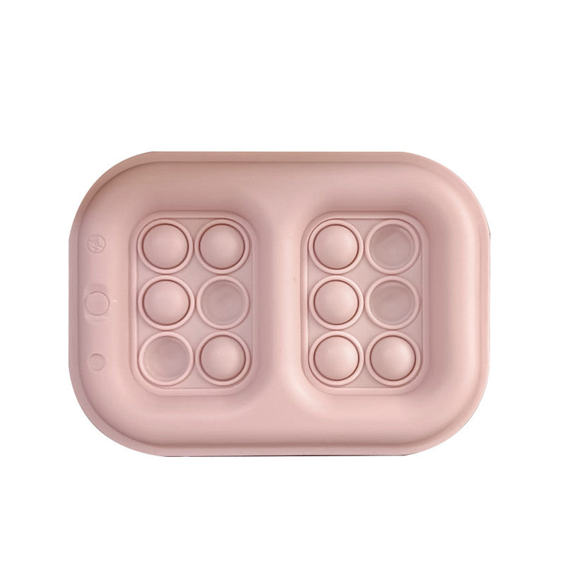 Melii Silicone Pop-It Ice Pack - PinkNursing & FeedingIs it an ice pack? Is it a toy? It’s both!! Have fun popping and squishing the silicone bubbles on our pop-it ice pack! Great for kids who love fidget and sensory toys but also need to keep their meals