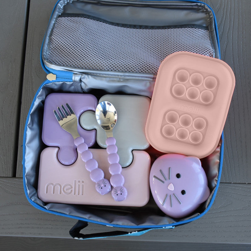 Melii Silicone Pop-It Ice Pack - PinkNursing & FeedingIs it an ice pack? Is it a toy? It’s both!! Have fun popping and squishing the silicone bubbles on our pop-it ice pack! Great for kids who love fidget and sensory toys but also need to keep their meals