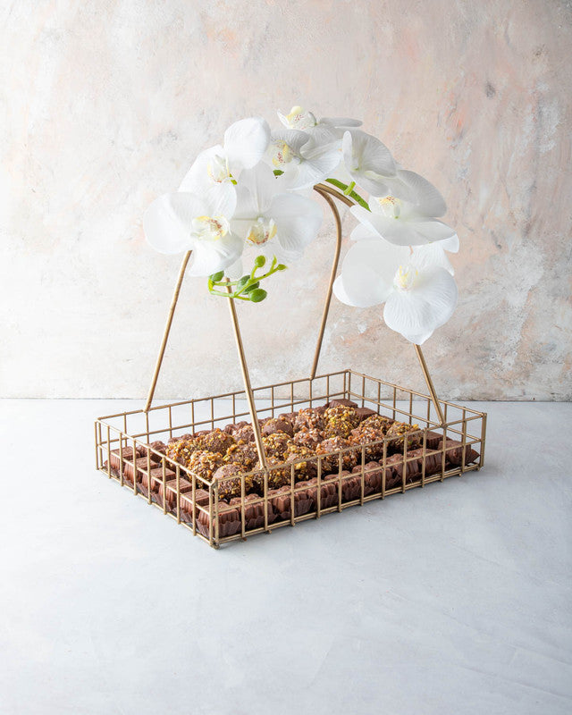 Truffles Overload by NJDChocolate & ConfectioneryYOUR GIFT CONTAINS Content: 30pcs of assorted chocolates 18pcs of assorted truffles Flavors: Assorted milk chocolates filled with Hazelnut, Nutella, Lotus, Peanut Butter, Pistachio, Caramel and Biscoff Roas