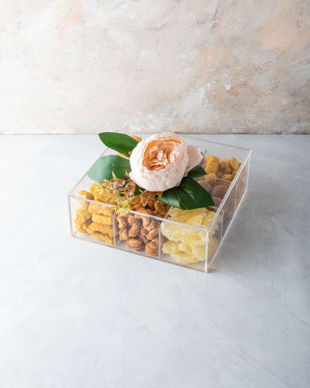 Diwali Gift Box by NJDNuts, Dates & Dried FruitsYOUR GIFT CONTAINS Content (approx.): Apricot 80gms Almonds 80gms Savory 150gms Indian savory snack with sesame seeds Truffles 16pcs assorted Dried Mango 80gms Caramelized Cashews 90gms Dried Pineapple 90gms