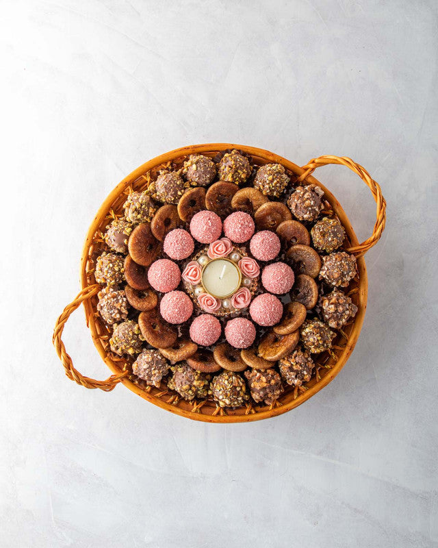 Diwali Hamper with Truffles and Dried FruitsNuts, Dates & Dried FruitsYOUR GIFT CONTAINS Content: 10pcs Roasted Nuts Truffles 10pcs Rose 200gms Figs 1 Medium size Designer Diya (design may vary) Flavors: Assorted truffles with roasted nuts, caramel, prali