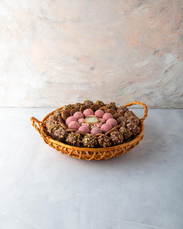 Diwali Hamper with Truffles and Dried FruitsNuts, Dates & Dried FruitsYOUR GIFT CONTAINS Content: 10pcs Roasted Nuts Truffles 10pcs Rose 200gms Figs 1 Medium size Designer Diya (design may vary) Flavors: Assorted truffles with roasted nuts, caramel, prali