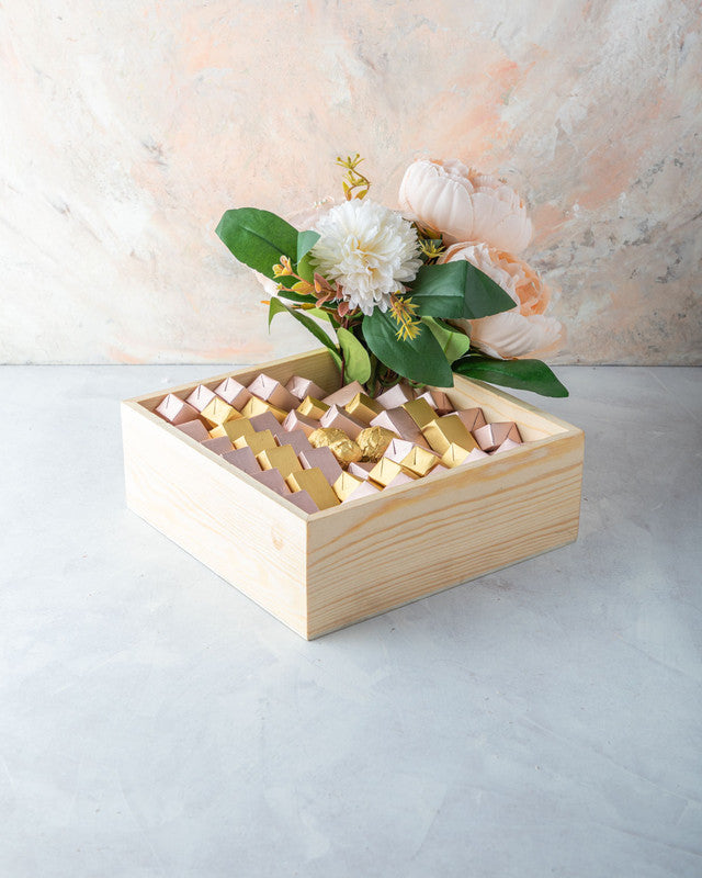 Pastel Diwali Collection by NJDChocolate & ConfectioneryYOUR GIFT CONTAINS Contains: Assorted Belgian chocolates 60pcs Flavors: Assorted chocolates with Praline, Ganache, Roasted Nuts, Biscoff and Puree flavors. Tray Dimensions: Wide: 20cmX20cm Height: 5c