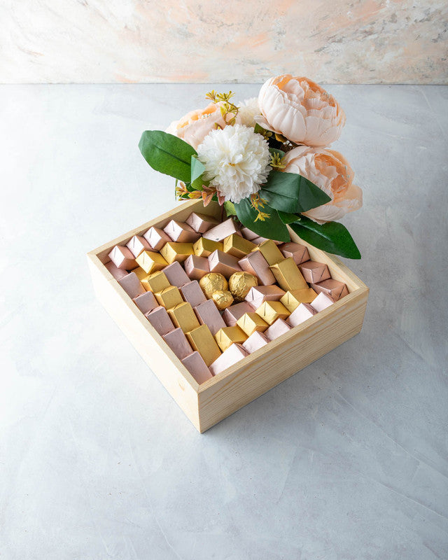 Pastel Diwali Collection by NJDChocolate & ConfectioneryYOUR GIFT CONTAINS Contains: Assorted Belgian chocolates 60pcs Flavors: Assorted chocolates with Praline, Ganache, Roasted Nuts, Biscoff and Puree flavors. Tray Dimensions: Wide: 20cmX20cm Height: 5c