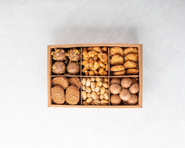 Sweet and Savoury Assortment by NJDNuts, Dates & Dried FruitsYOUR GIFT CONTAINS Content: Assorted Truffles 14pcs Chocolate cookies 8pcs Pistachio - 100gms Caramalized Cashews 150gms Savory cookies 150gms Flavors Chocolate Cookies Roasted Nuts Truffles Car