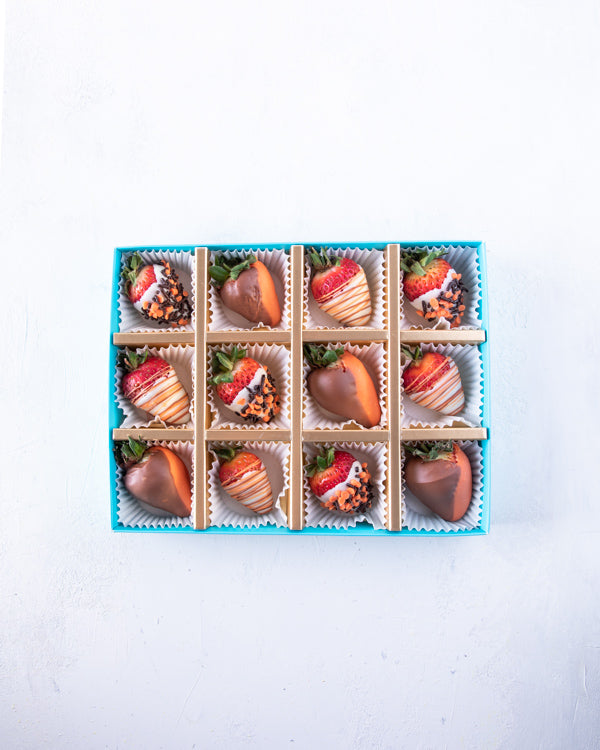 12 pcs Halloween Special by NJDChocolate & Confectionery12pcs dressed-up strawberries, dipped in colored chocolate and decorated with additional melted chocolate. Packed as shown in the picture Tray dimensions: length: 19cm wide: 24cm HANDLING AND STORAGE