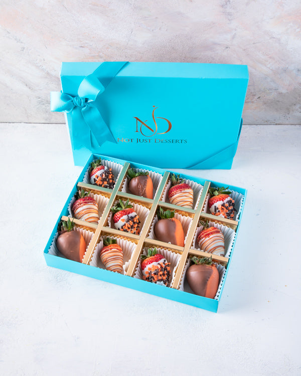 12 pcs Halloween Special by NJDChocolate & Confectionery12pcs dressed-up strawberries, dipped in colored chocolate and decorated with additional melted chocolate. Packed as shown in the picture Tray dimensions: length: 19cm wide: 24cm HANDLING AND STORAGE