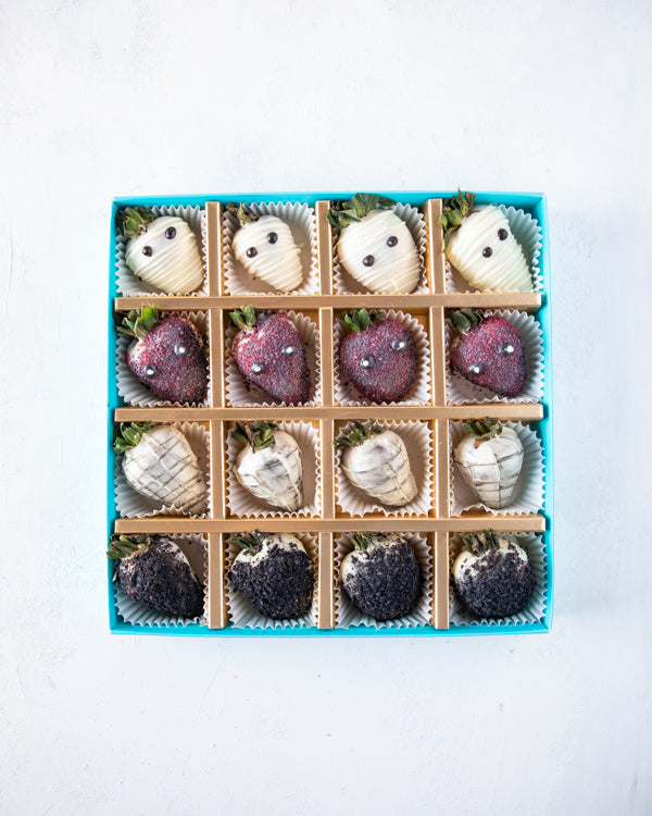 Mummy & Creepy StrawberryChocolate & Confectionery16pcs dressed-up strawberries, dipped in colored chocolate and Dark chocolate. Hand designed, decorated with edible glitter Packed as shown in the picture Box dimensions: length: 24cm wide: 24cm HANDLING A