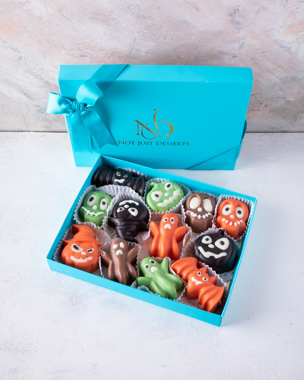 Yummy Trick or Treat BoxChocolate & Confectionery12pcs chunky chocolates filled / 800gms These small Ghost shaped Chocolates are a sure treat this Halloween, perfect to hand out to those Trick or Treaters. Packed as shown in the picture Box dimensions: le