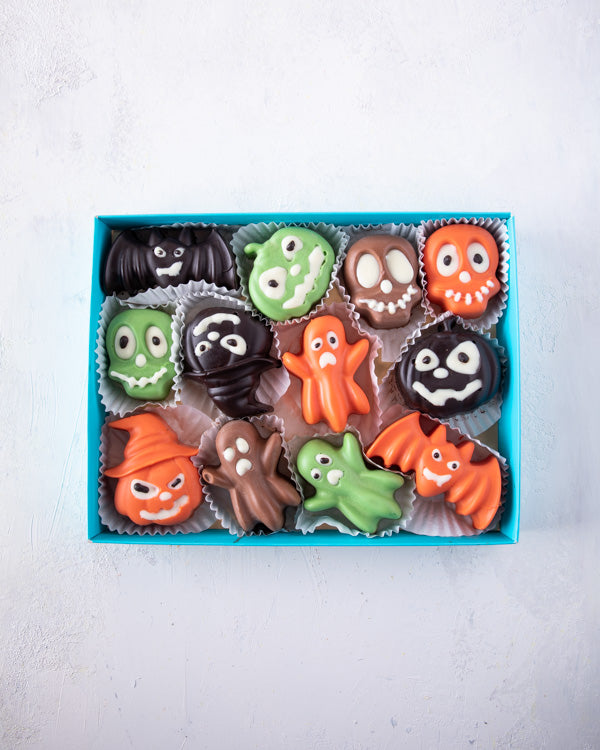 Yummy Trick or Treat BoxChocolate & Confectionery12pcs chunky chocolates filled / 800gms These small Ghost shaped Chocolates are a sure treat this Halloween, perfect to hand out to those Trick or Treaters. Packed as shown in the picture Box dimensions: le
