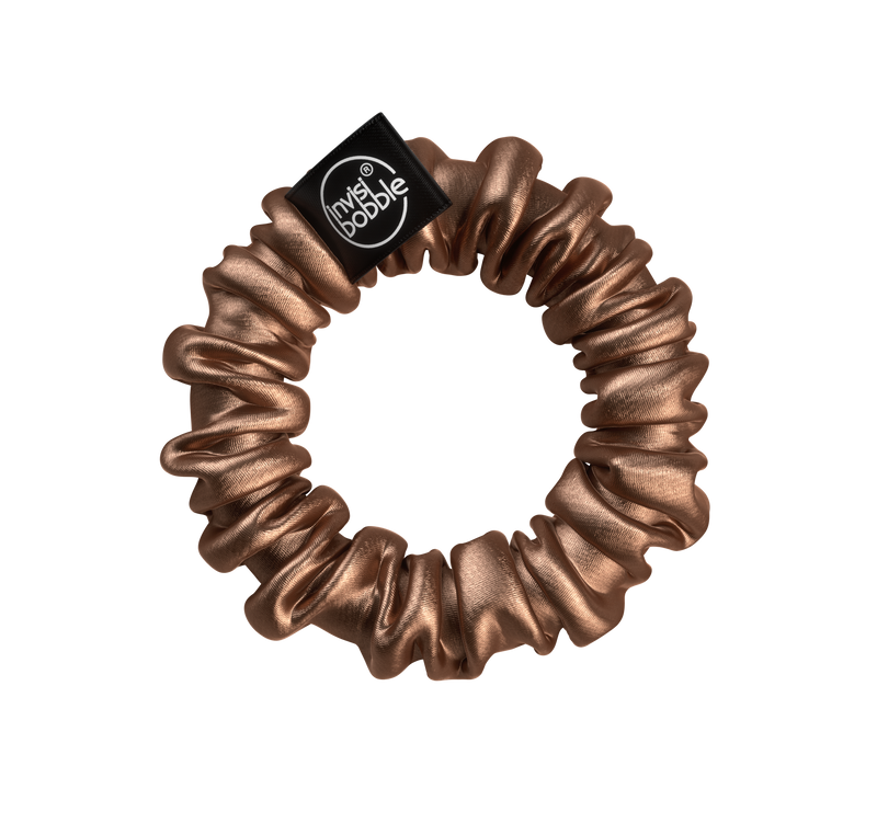 SPRUNCHIE SLIM True Golden (HP) 2pcs/packHair CareThe new era of hair donuts has begun! The velvety soft and flexible Sprunchie donut is a great accessory and a gentle attachment to pony tails. The Sprunchie Slim donut also includes an Invisibobble SLIM h