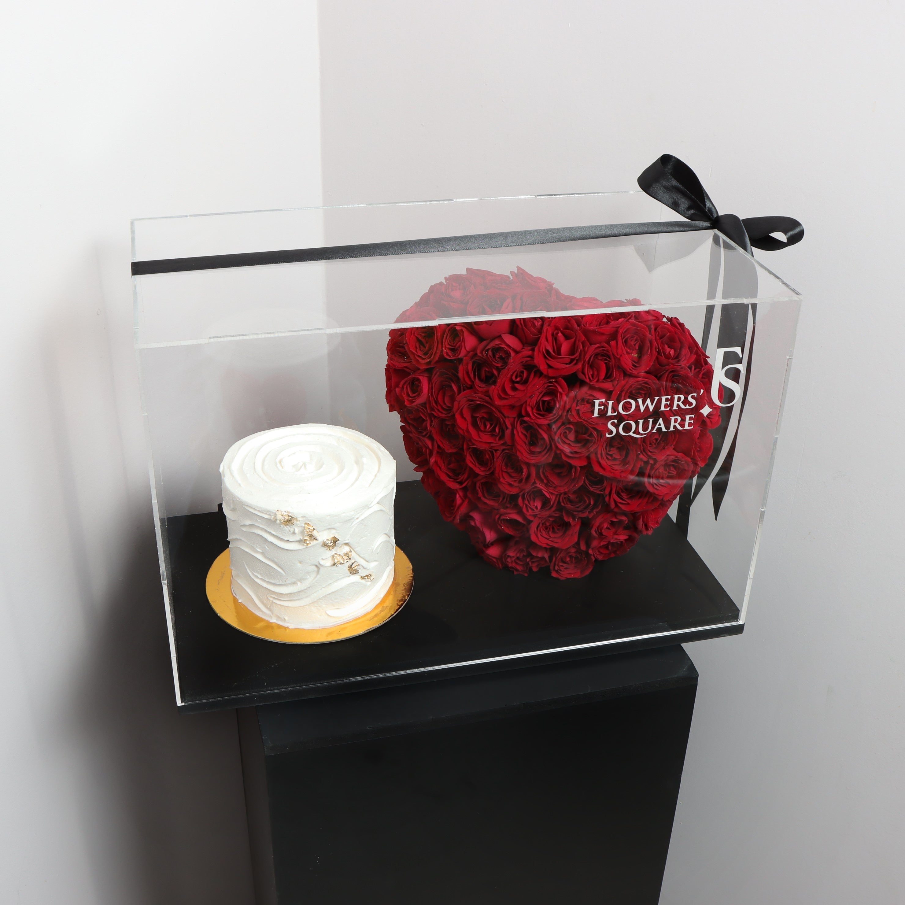 Cake and Red Heart in AcrylicSame-day delivery This elegant and modern Cake and Red Heart in Acrylic is the perfect addition to any celebration. The durable acrylic material ensures longevity and the intricate design adds a touch of sophistication. Perfec