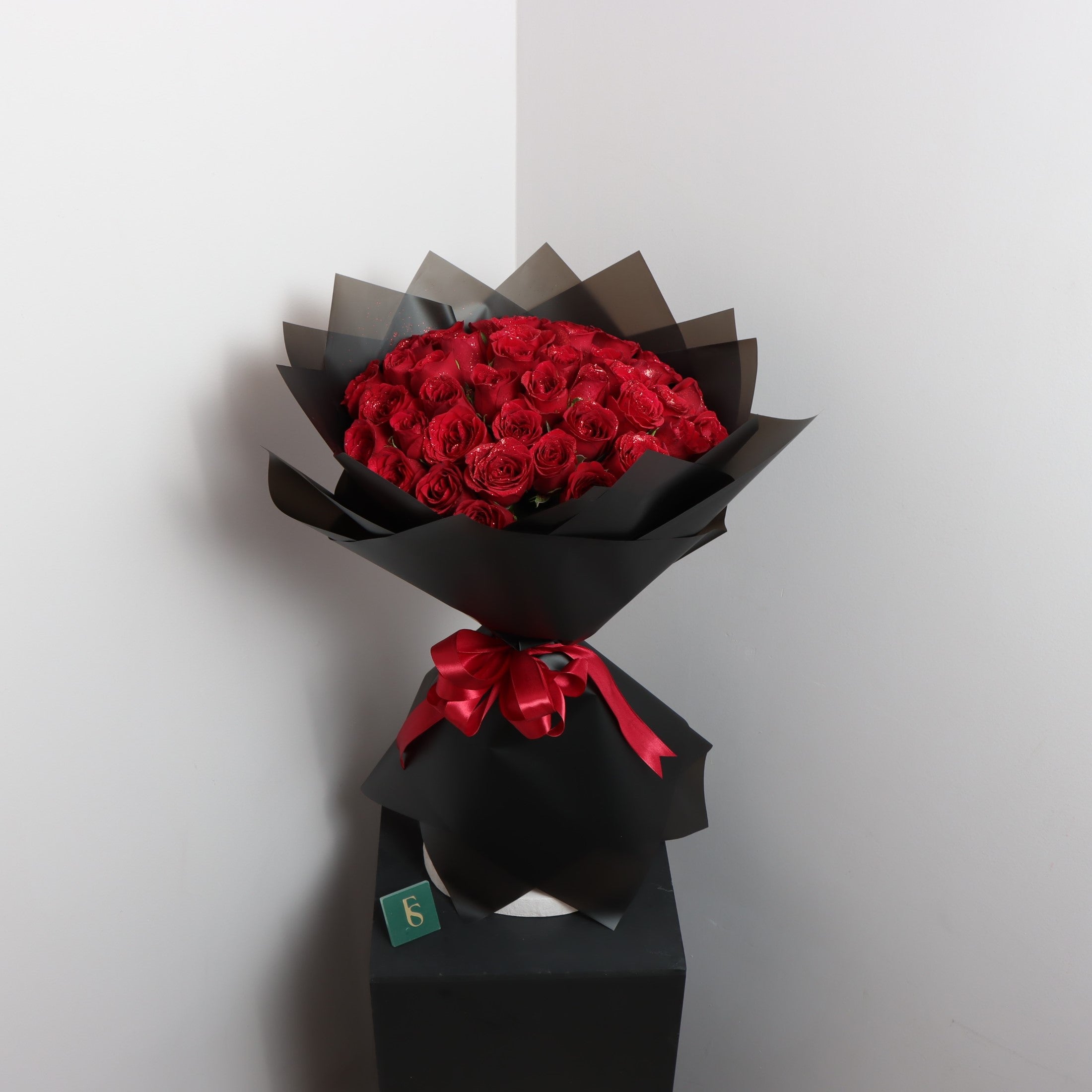 Sparkling Red RosesFlowersSame-day delivery Introducing Sparkling Red Roses - the perfect addition to any special occasion. These vibrant and luxurious roses are sure to make a statement with their sparkling appearance. Show your loved ones how much you c