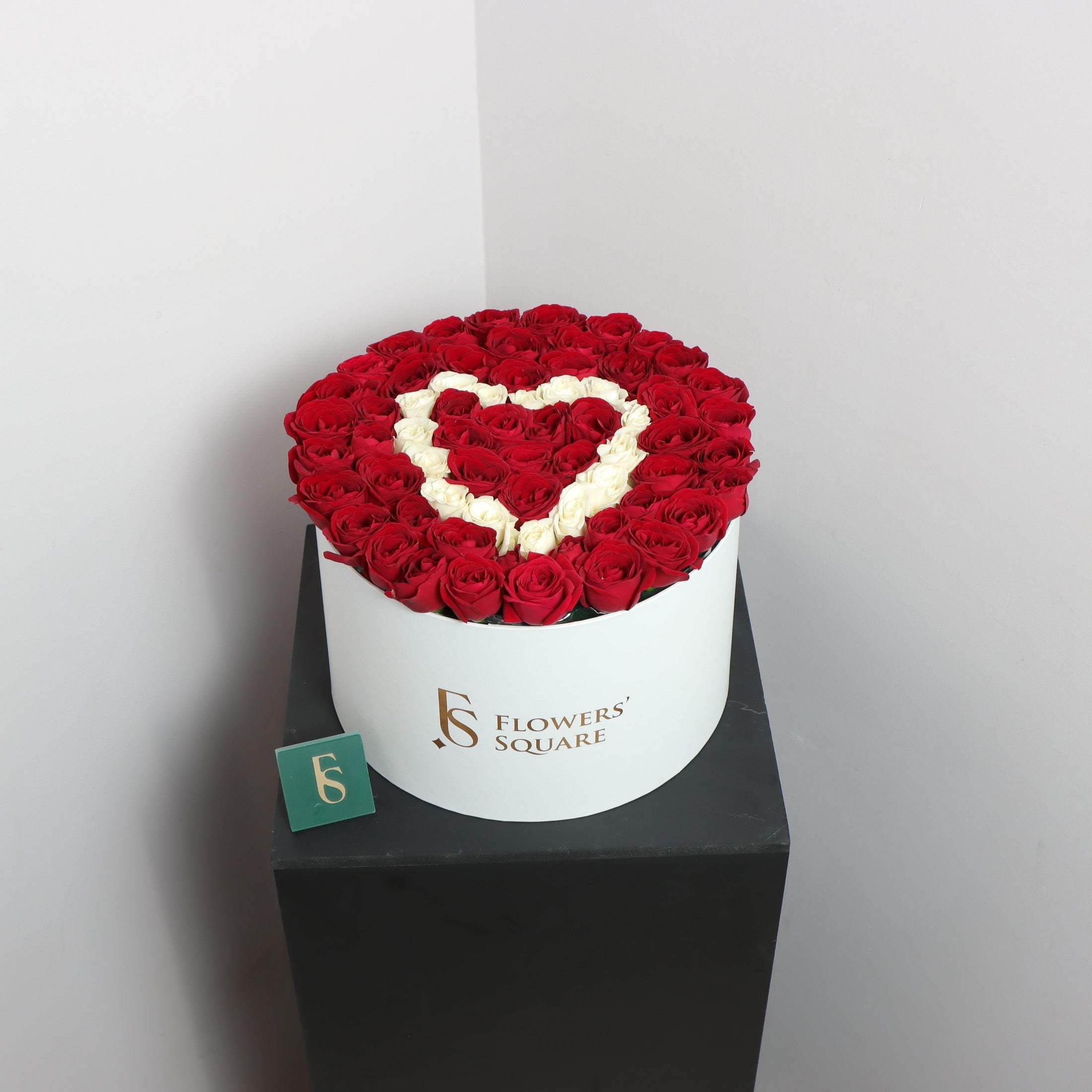 Heart BoxFlowersSame-day delivery Experience the perfect Valentine's Day with our Heart Box. This beautifully designed box features a vibrant bouquet of flowers that will surely show your love and appreciation. A must-have for any romantic occasion.